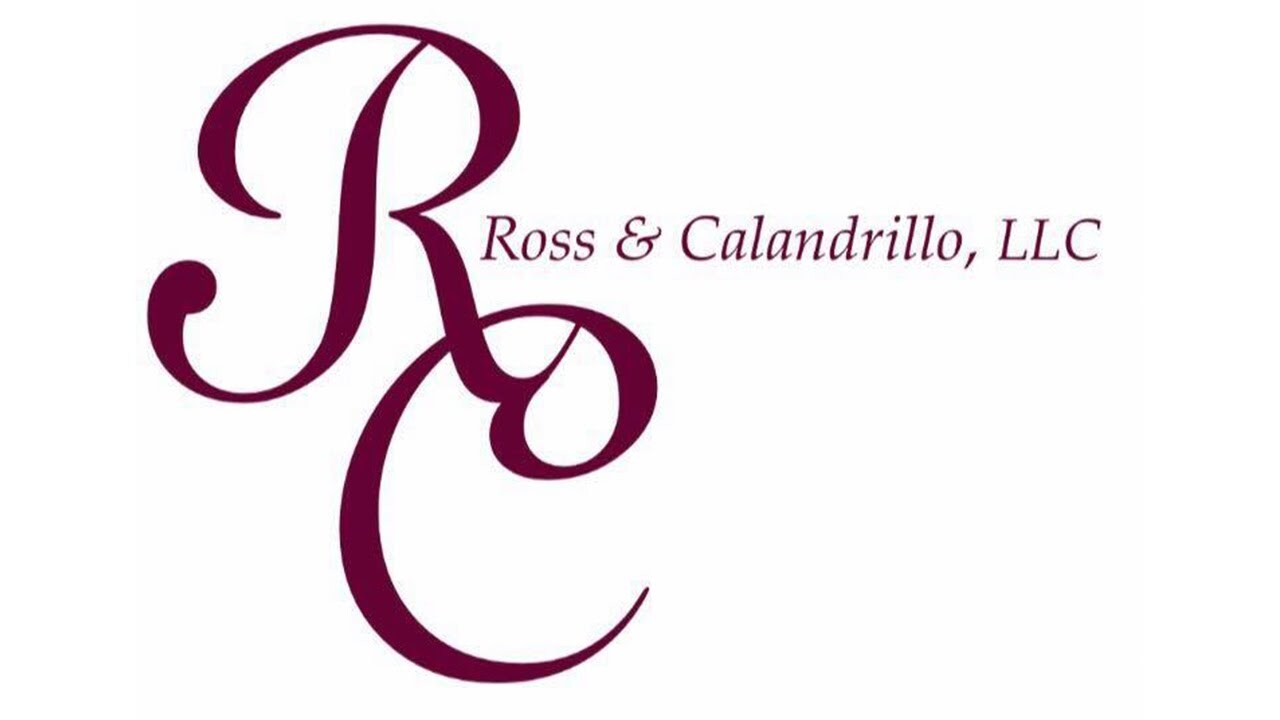 Logo with stylized maroon letters 