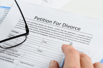 petition for divorce paper and glasses