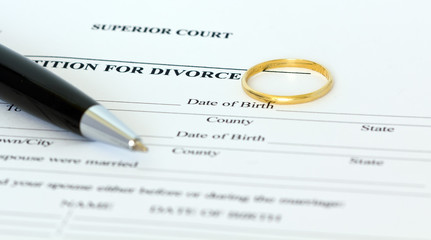 divorce agreement with ring and pen