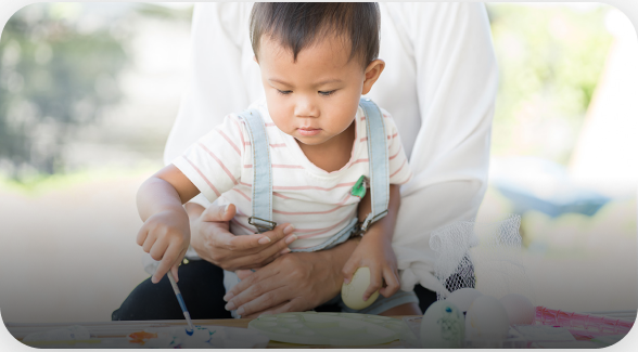 small baby boy with a parent