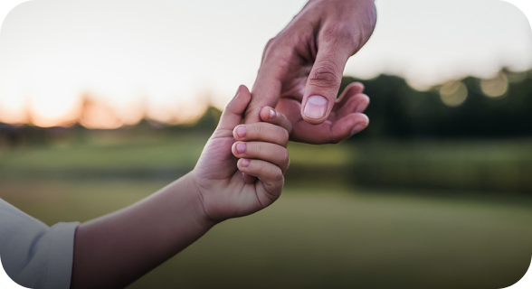 parent and child holding hands