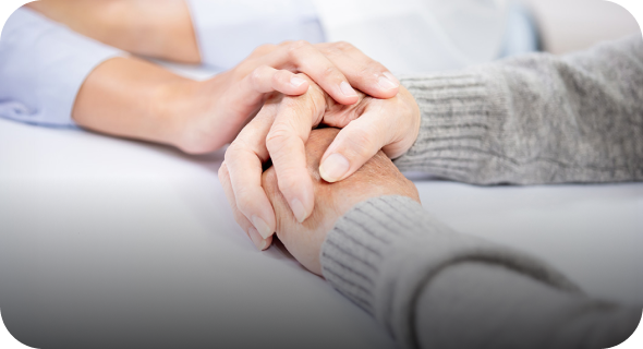 woman holding another woman's hands